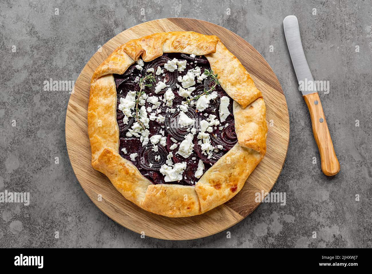Savory root vegetable galette. Served with goat cheese Stock Photo Alamy