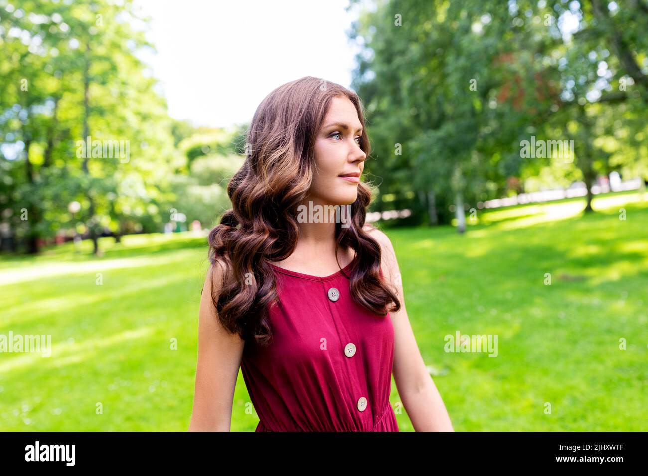 portrait of beautiful woman at summer park Stock Photo - Alamy