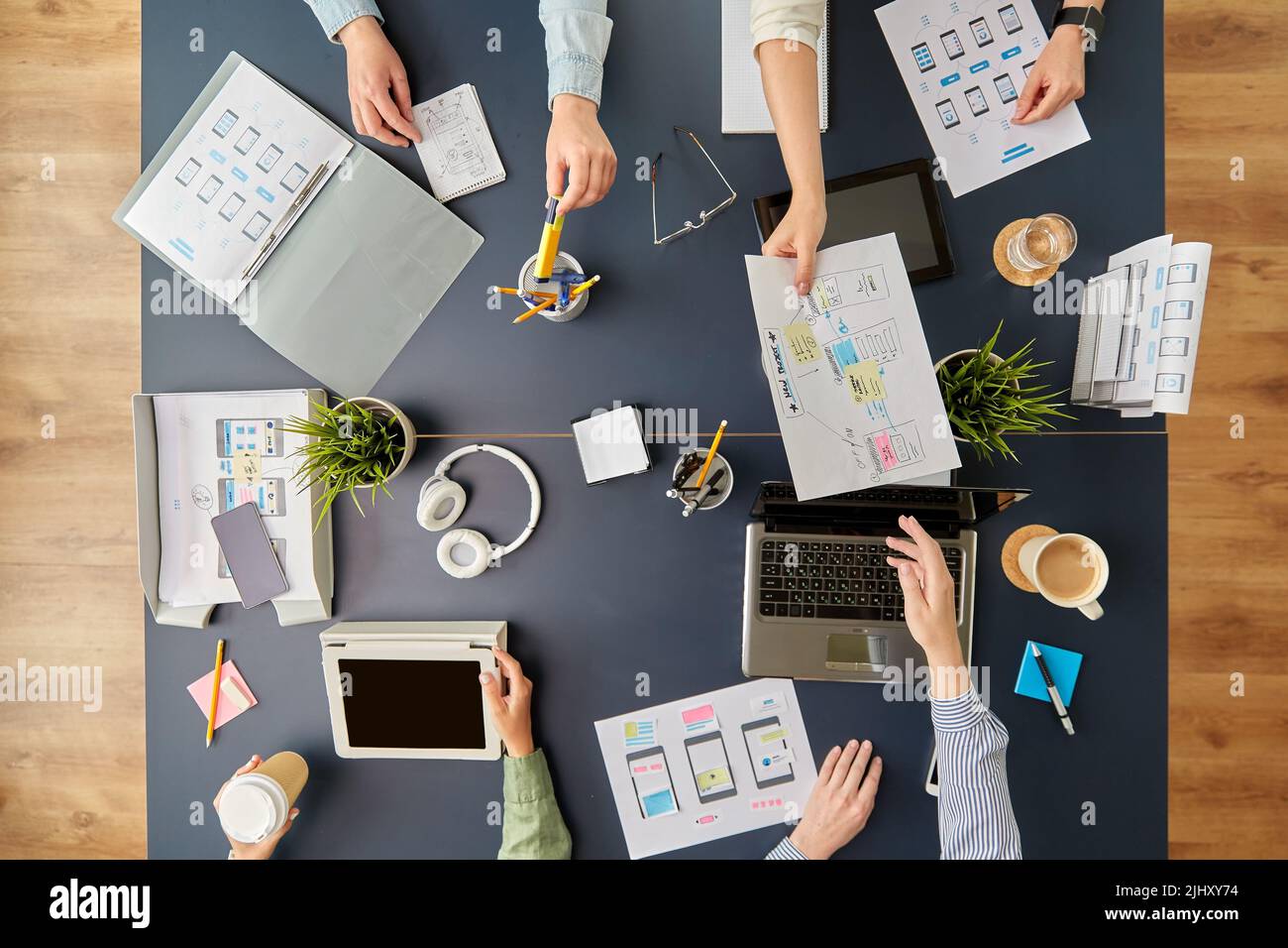 business team with gadgets working at office table Stock Photo