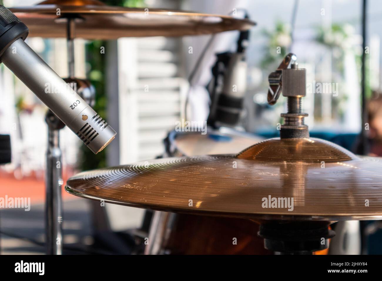 Hi-hat mic from a drum set at an outdoor festival Stock Photo - Alamy