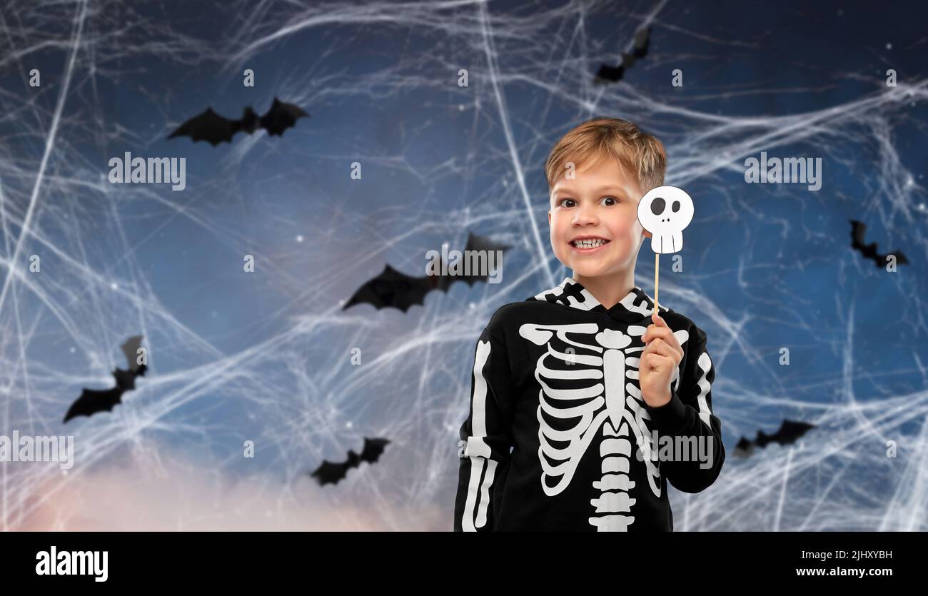 boy in halloween costume of skeleton making faces Stock Photo
