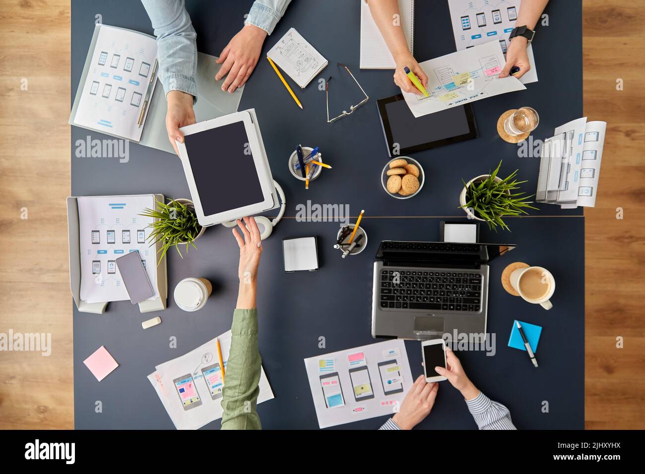 business team with gadgets working at office table Stock Photo