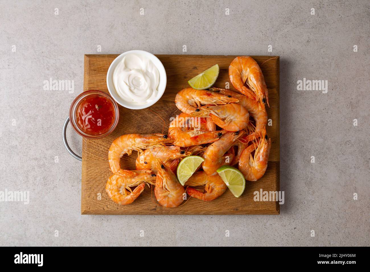 Overhead view of shrimps on wooden platter seafoods Stock Photo