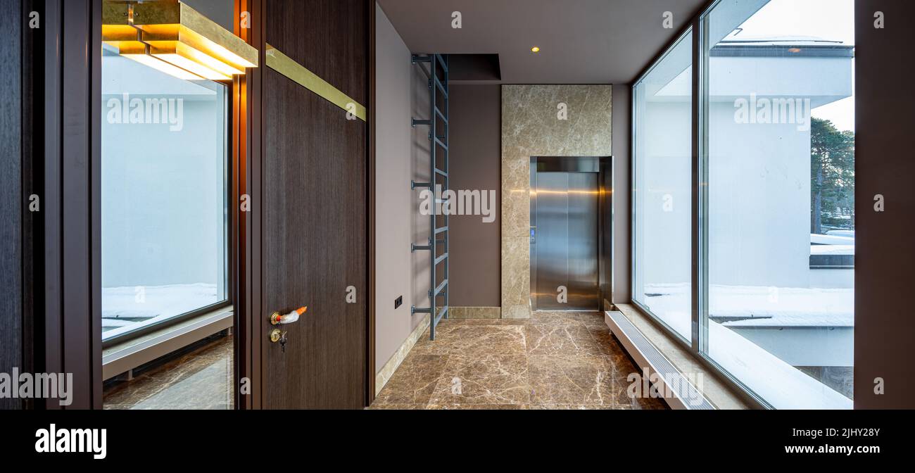 Modern interior of entrance hall in luxury residential apartment ...