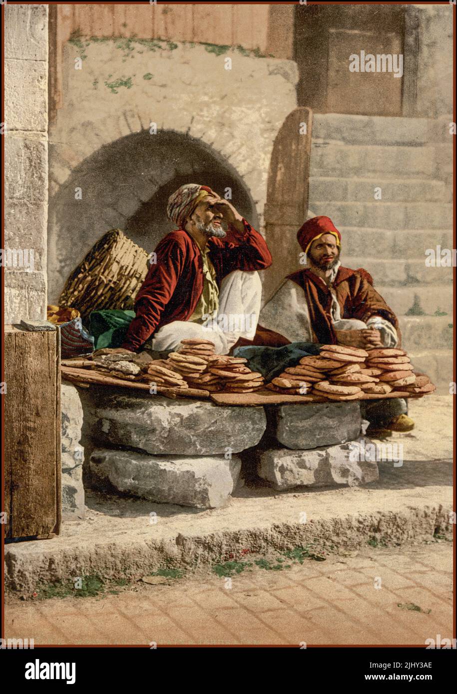 JERUSALEM Vintage Travel Food 1900s of Street Bread sellers of Arab Jerusalem, Holy Land Palestine Date between 1890 and 1900  Victorian photochrom image of street food bread seller color. One of the oldest cities in the world, and is considered holy for the three major Abrahamic religions: Judaism, Christianity, and Islam. Stock Photo