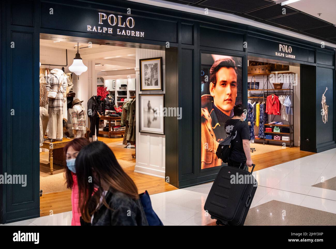Shoppers walk past the American fashion brand Polo Ralph Lauren store seen  in Hong Kong. (Photo by Budrul Chukrut / SOPA Images/Sipa USA Stock Photo -  Alamy