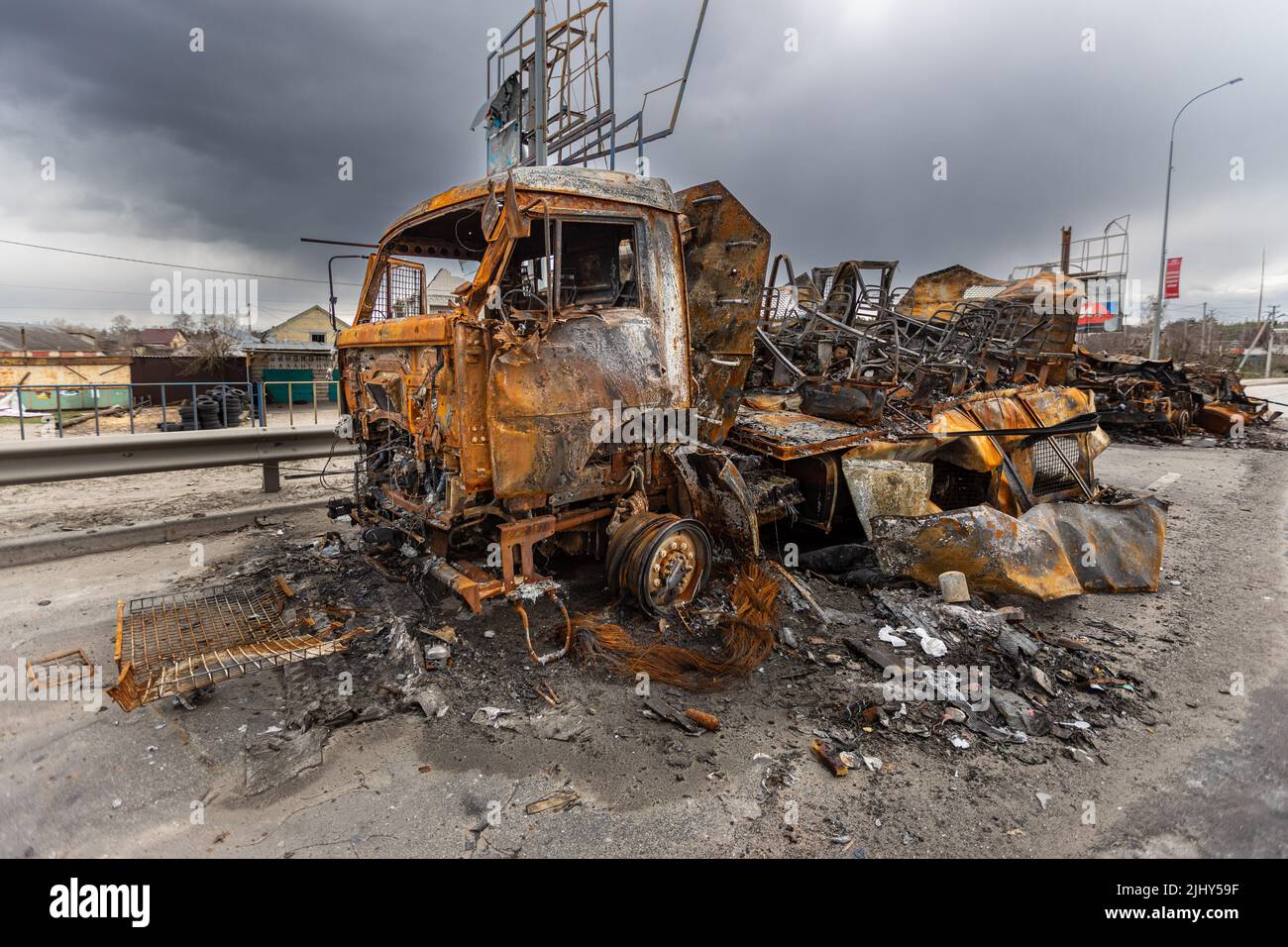 Burnt military vehicles of Russian soldiers on the bridge across the ...
