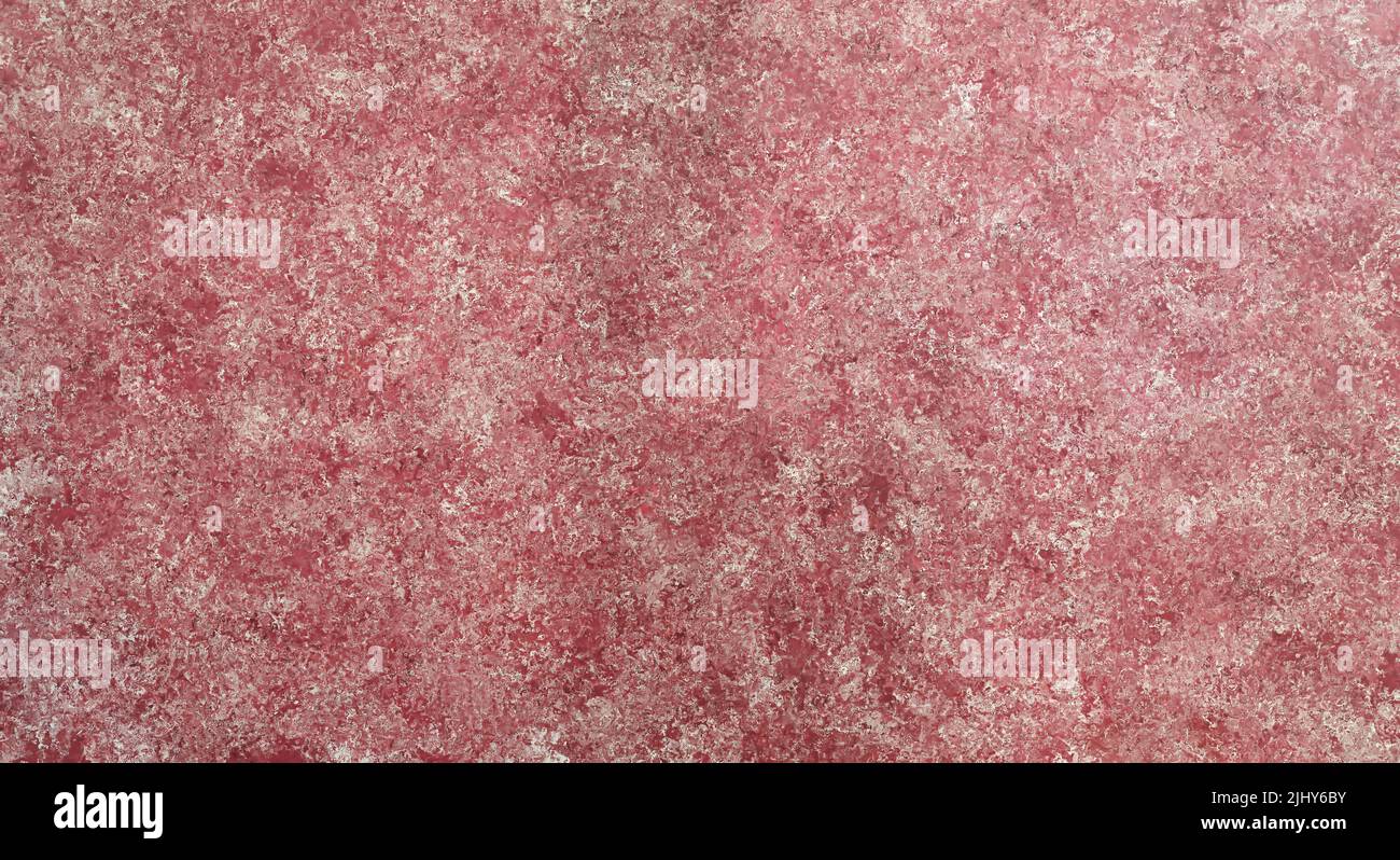 Red and peach pink textured background wallpaper with white flecks. Soft focus mottled backdrop with copy space. Stock Photo