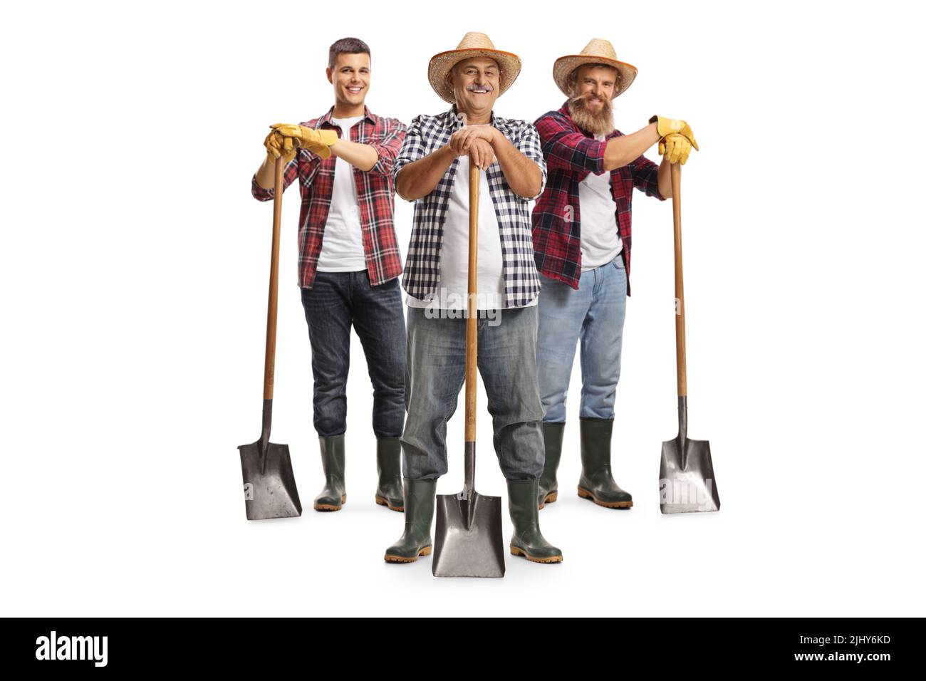 Full length portrait of male farmers standing with shovels isolated on ...