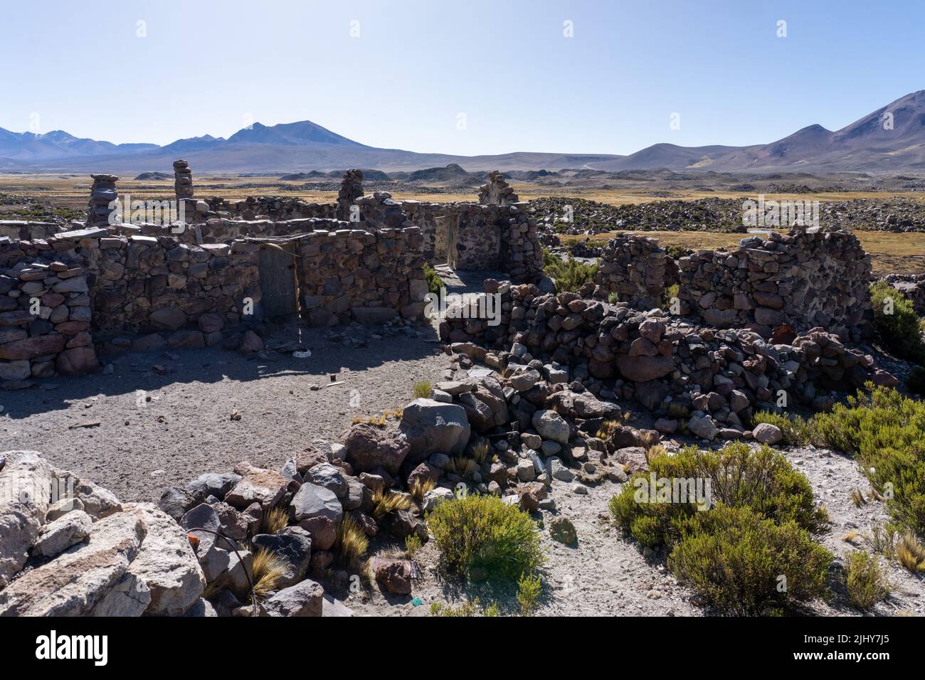 Ruined stone walls of a village near Parinacota in Lauca National Park, Chile. Stock Photo