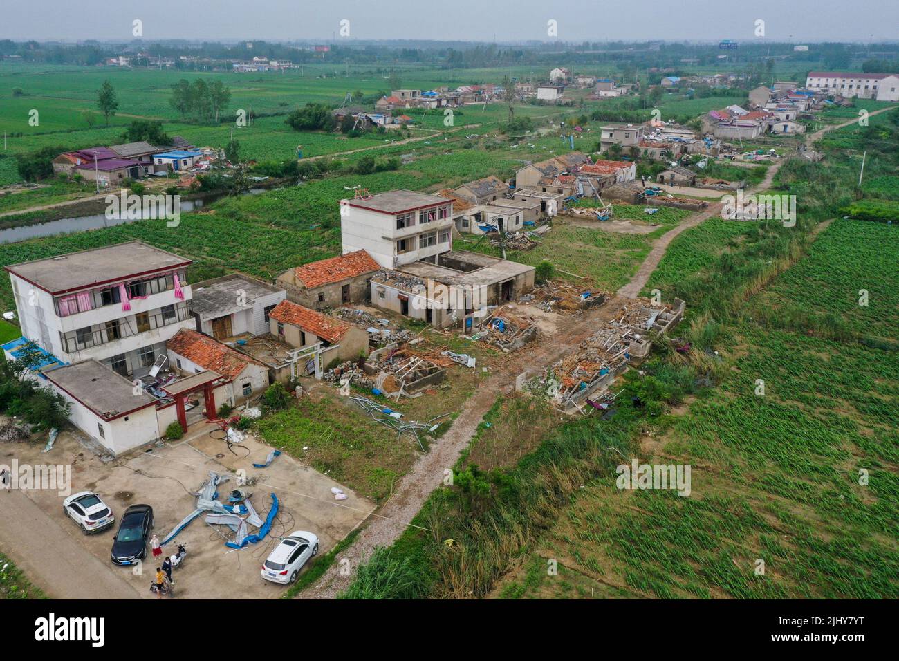 (220721) -- NANJING, July 21, 2022 (Xinhua) -- Aerial photo taken on July 21, 2022 shows Xiaomao Village of Xiaoyi Township after a tornado hit, Guanyun County, east China's Jiangsu Province. A tornado struck Lianyungang City in east China's Jiangsu Province on Wednesday, resulting in one fatality and 25 injured, local emergency management bureau said Thursday. The tornado swept through 11 villages in four townships of Lianyungang at around 12 p.m. on Wednesday. Emergency workers were quick to arrive at the scene and the injured are currently being treated. Relief work is also being carr Stock Photo