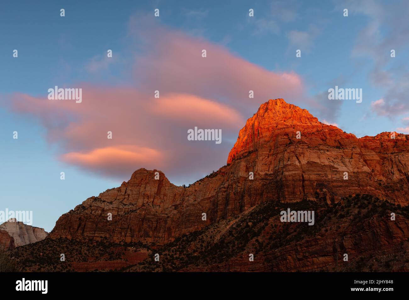 Clouds over the cliffs at sunset, Zion National Park, Utah Stock Photo