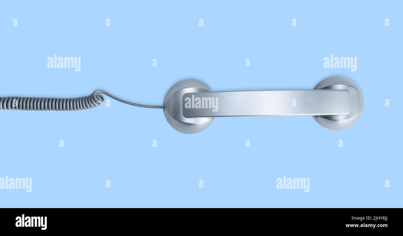 Telephone handset isolated on blue background. Contact us banner. Top view Stock Photo