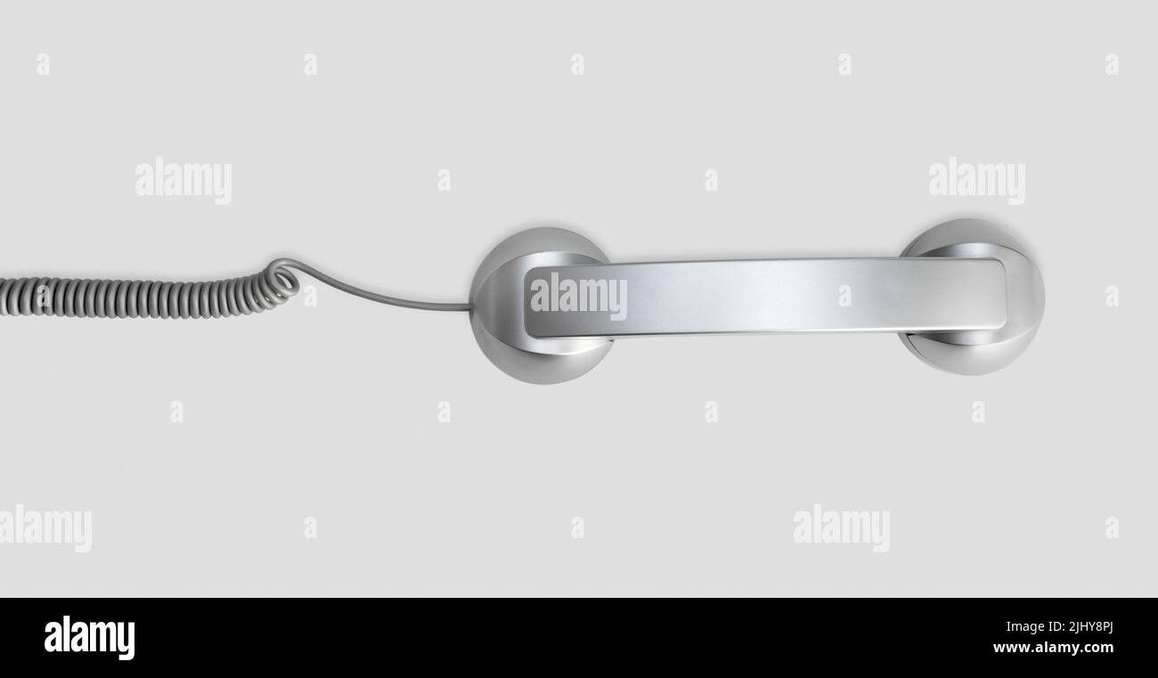Telephone handset isolated on gray background. Contact us banner. Top view Stock Photo