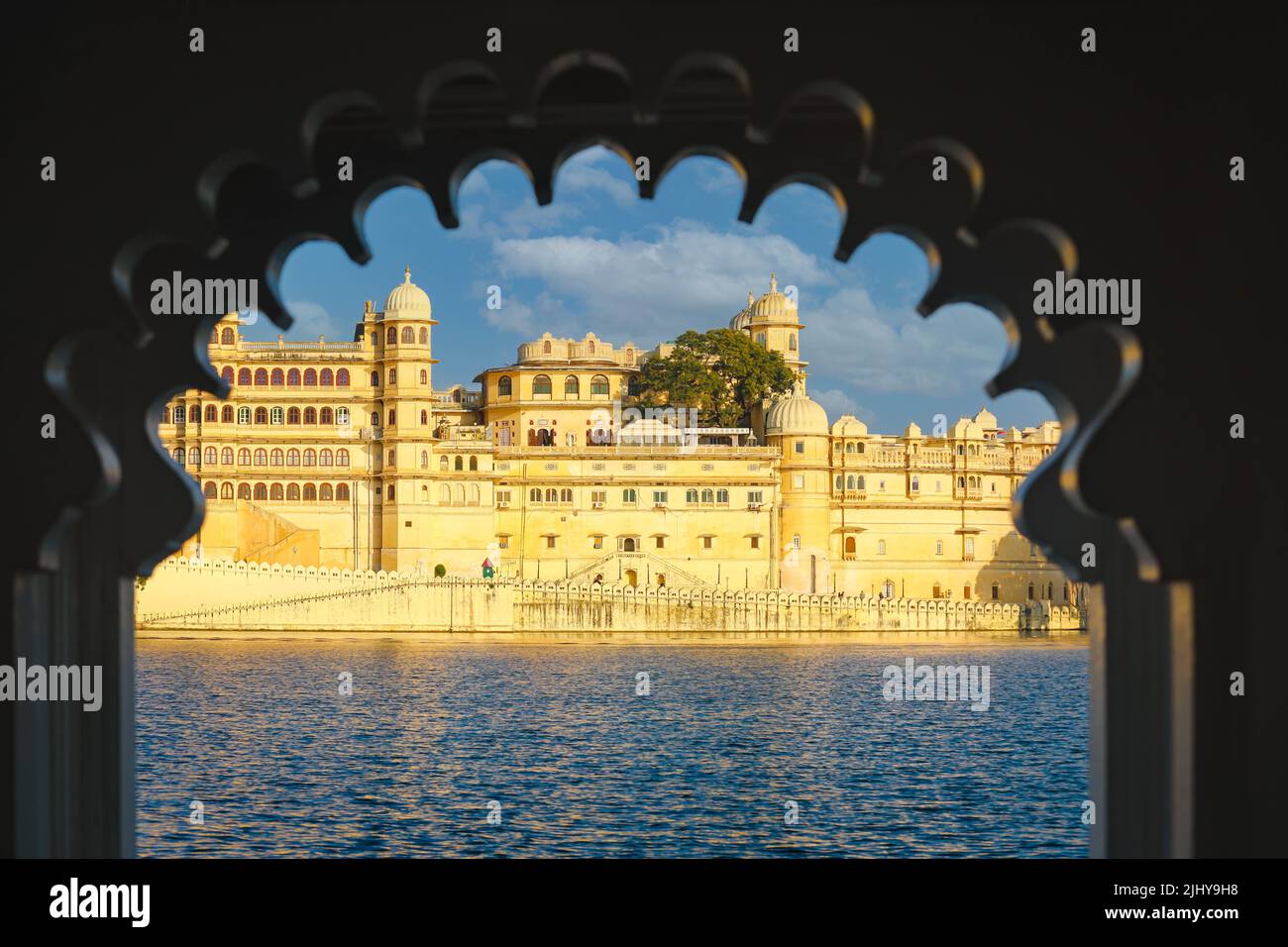 View of the Udaipur City Palace Complex from lake Pichola in Rajasthan