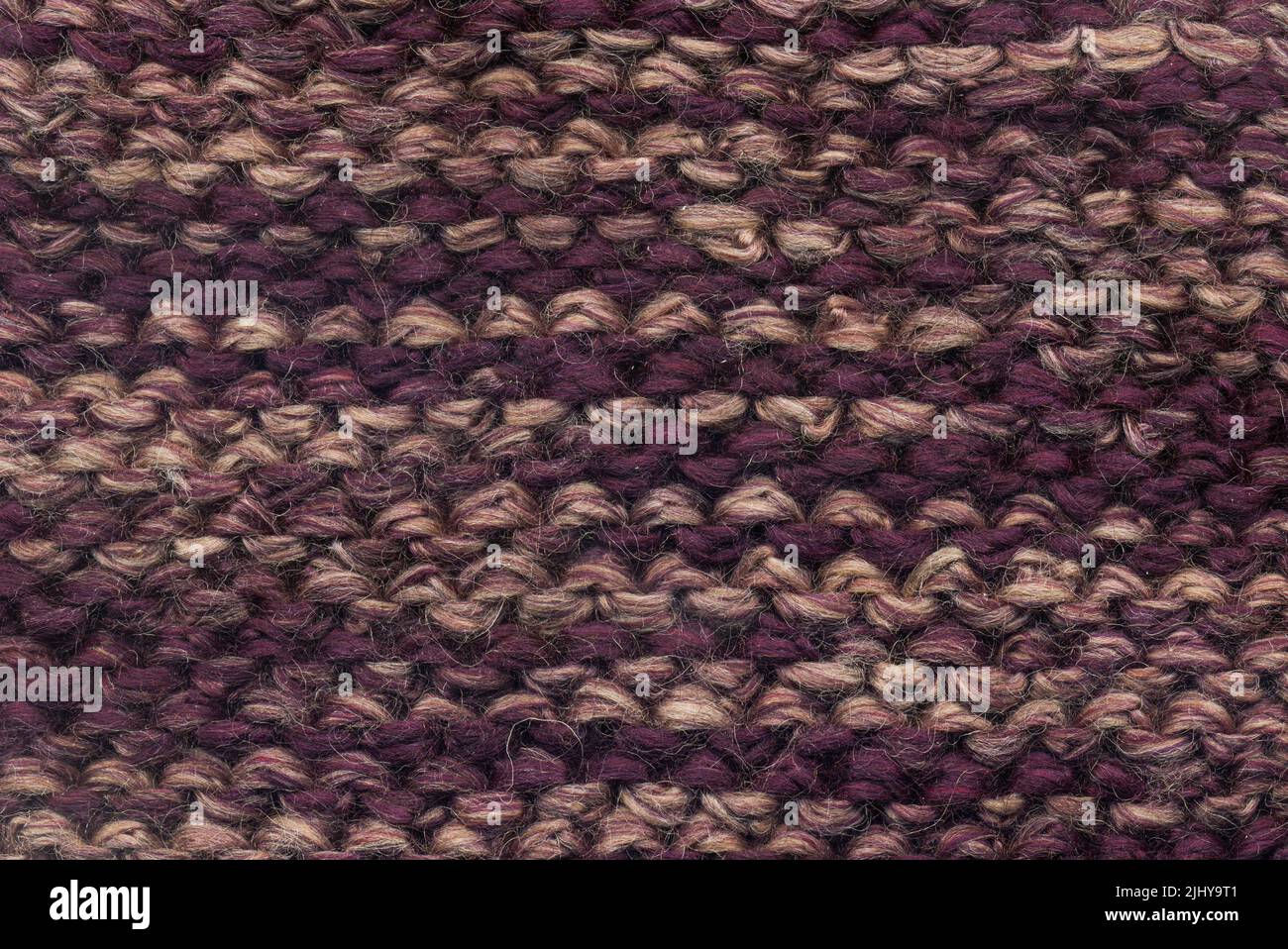 Abstract knitted purple background texture Stock Photo