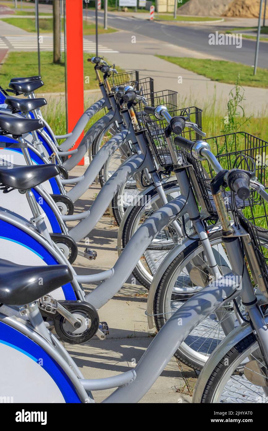 City bikes lined up in a row in Poland Stock Photo Alamy