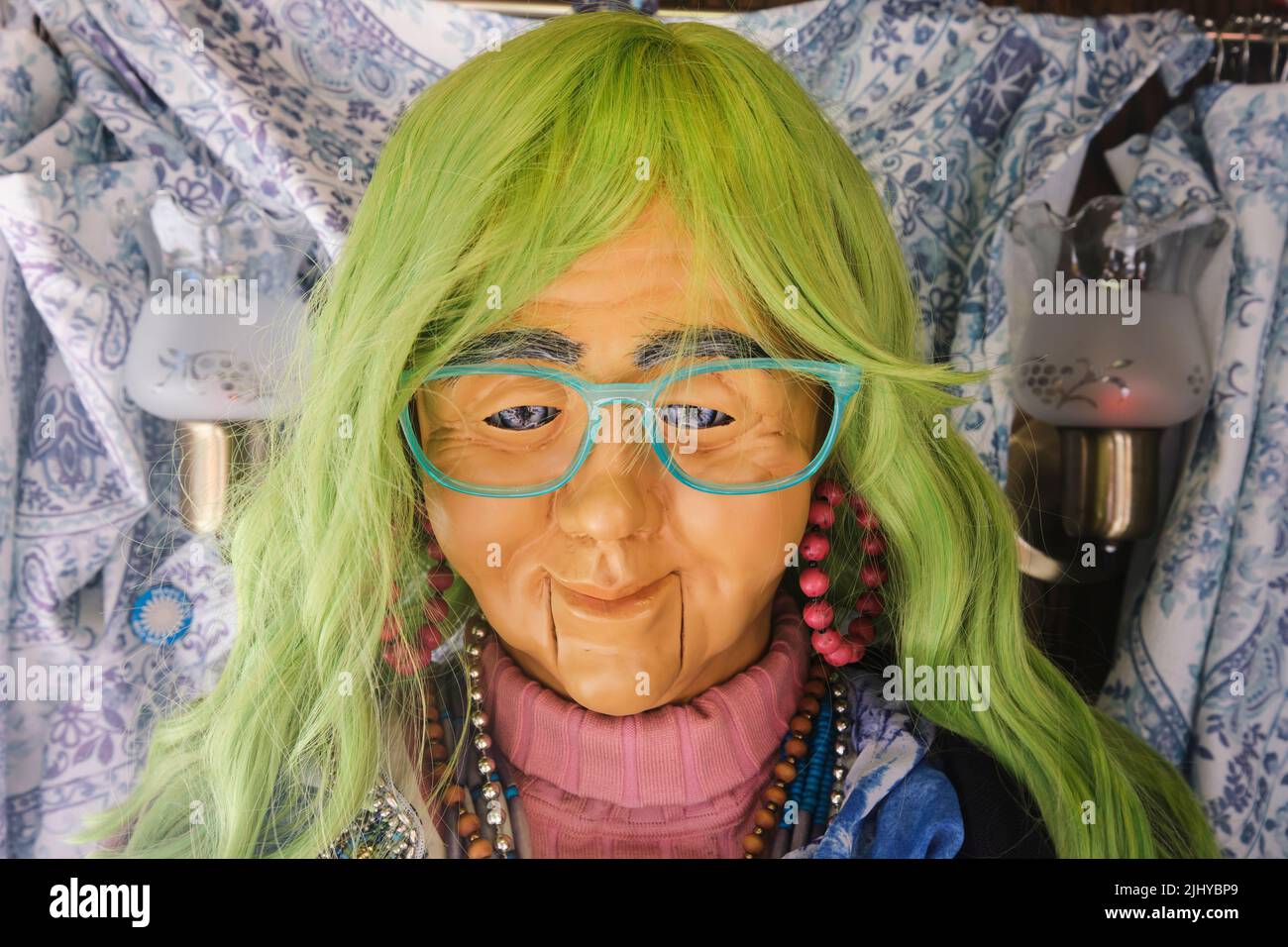 A cute, silly, creepy woman fortune teller figure with green hair. At the Stagecoach Greens miniature golf course in the Mission area of San Francisco Stock Photo