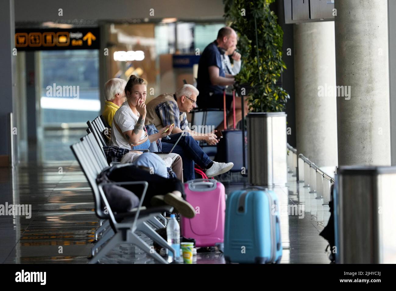 Passengers wait for their flight in Riga International Airport, Latvia July 21, 2022. REUTERS/Ints Kalnins Stock Photo