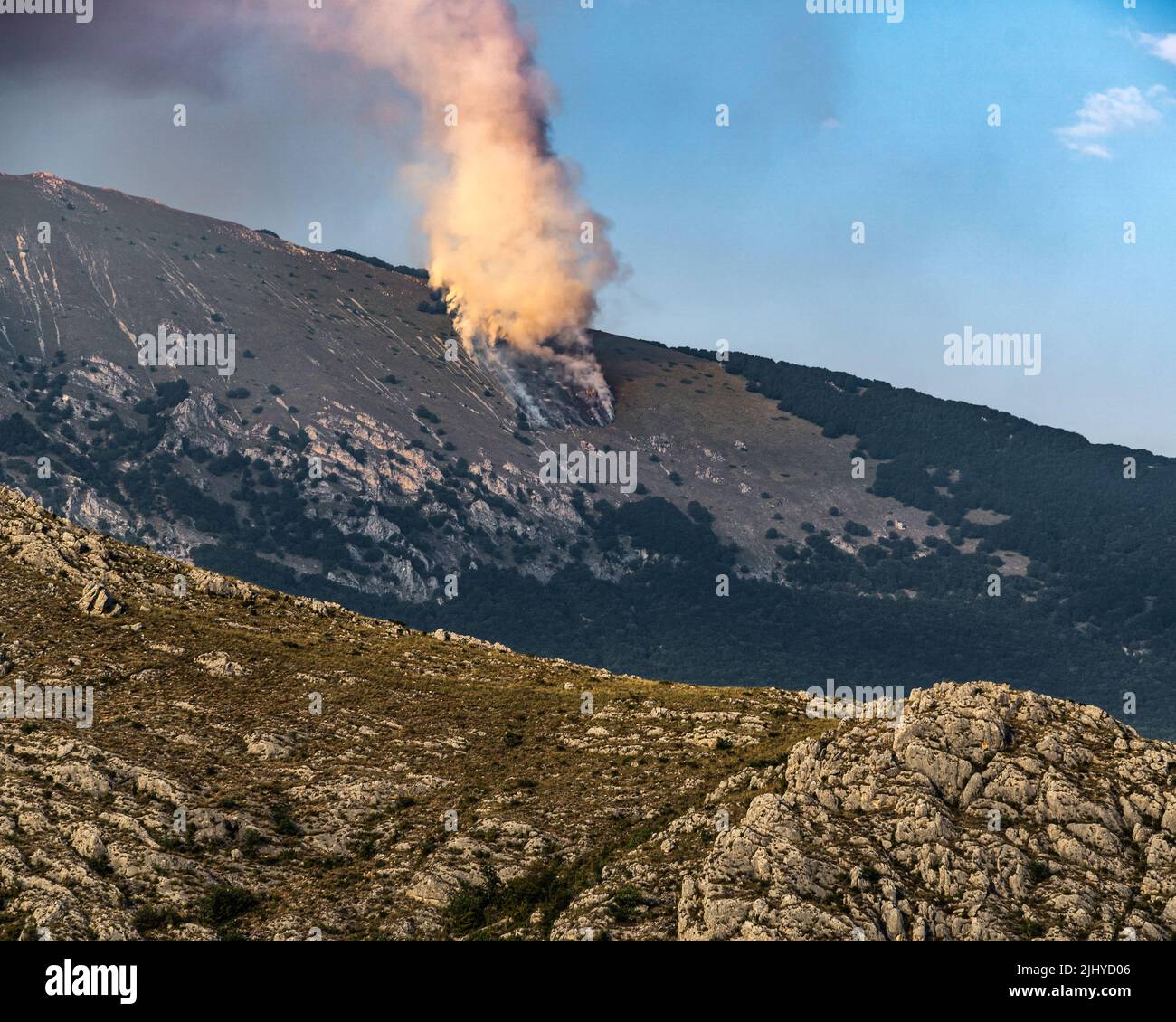 Fire on a high altitude prairie in the mountains of the Gran Sasso and Monti della Laga National Park. Abruzzo, Italy, Europe Stock Photo