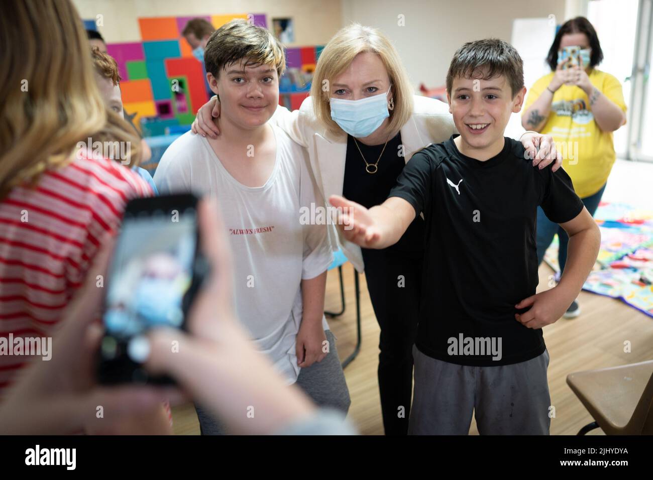 Foreign Secretary and Tory leadership candidate, Liz Truss meeting staff and children during a visit to the children's charity, Little Miracles in Peterborough, to speak about the cost-of-living pressures and her vision to ease the burden on families. Picture date: Thursday July 21, 2022. Stock Photo