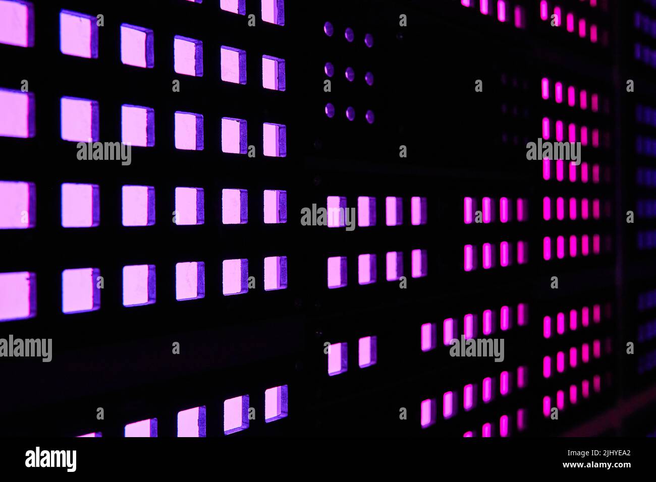 Wall of purple square lights on computer Stock Photo