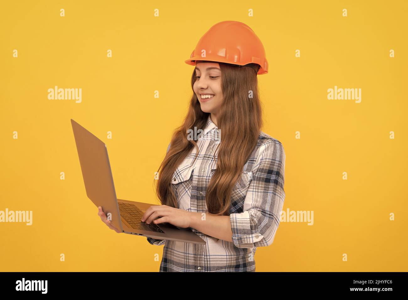 check the email. happy labour day. future career. teen girl in helmet ...
