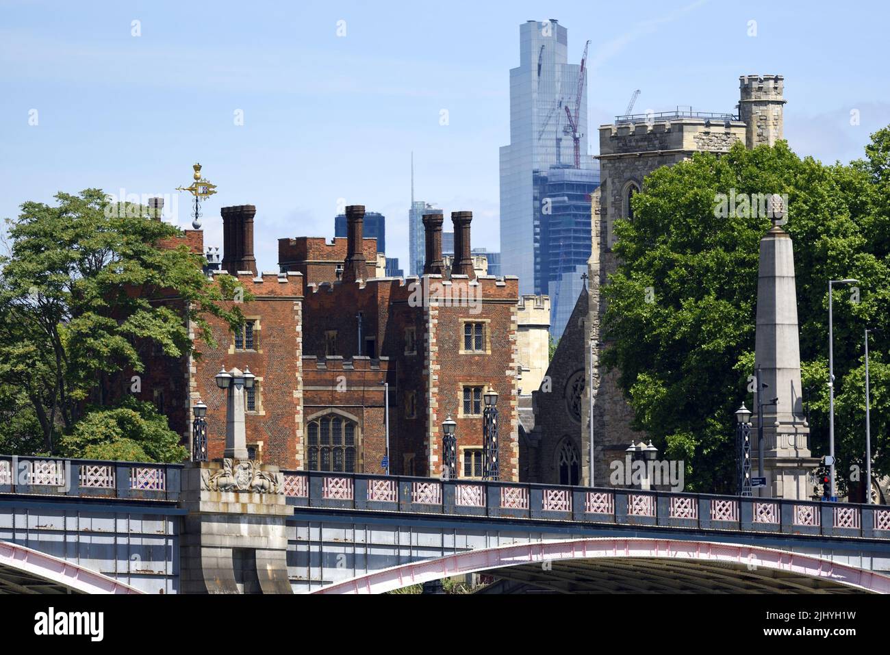 London, England, UK. Lambeth Palace, Lambeth Bridge and the NatWest Tower / Tower 42 seen from Millbank Stock Photo
