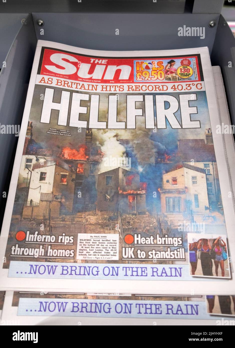 Front page of The Sun climate crisis newspaper headline 'As Britain Hits Record 40.3°C 20 July 2022 40°C Hellfire' homes burning in heatwave London UK Stock Photo