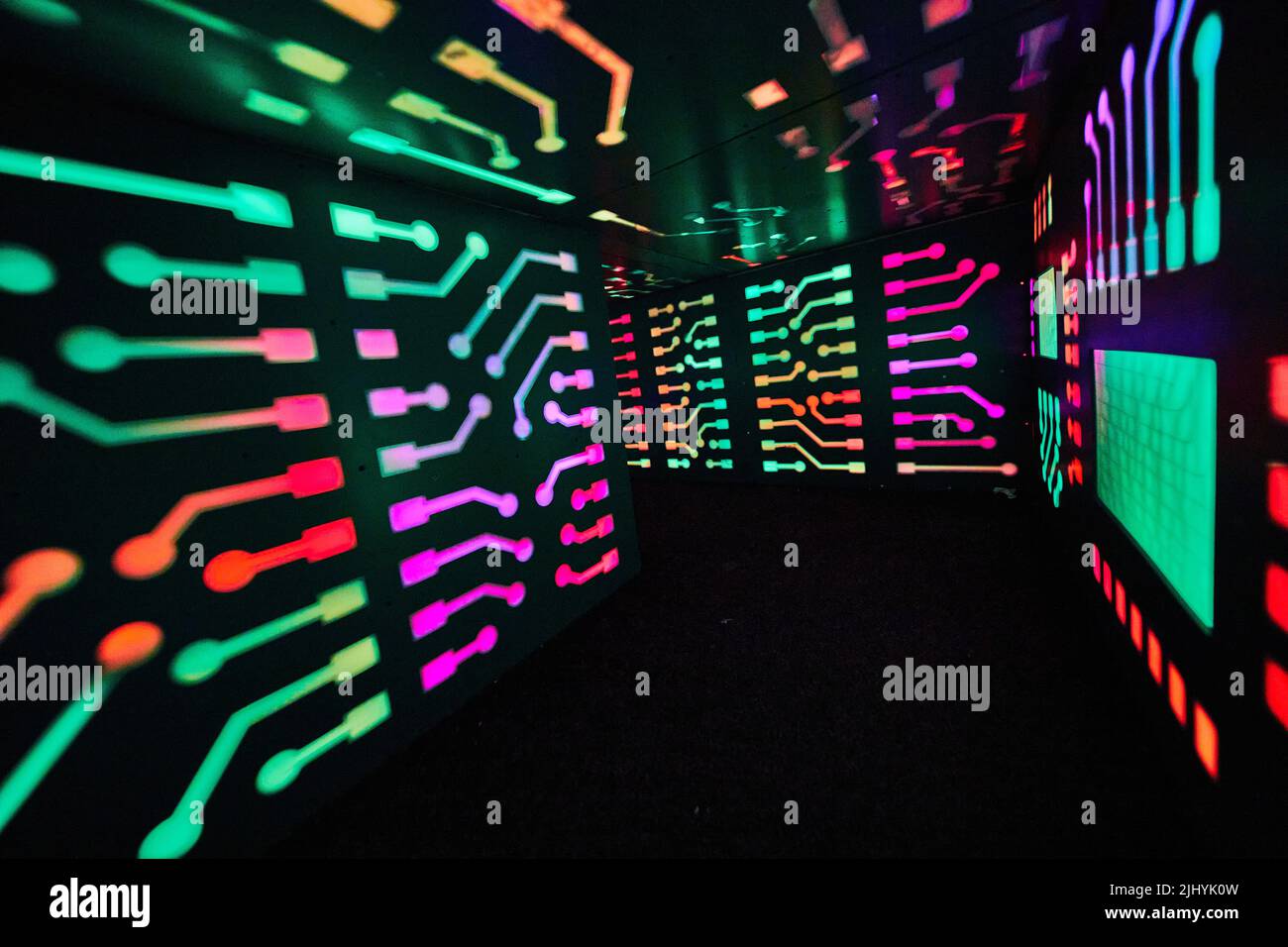 Multi-color computer lights in small tunnel Stock Photo