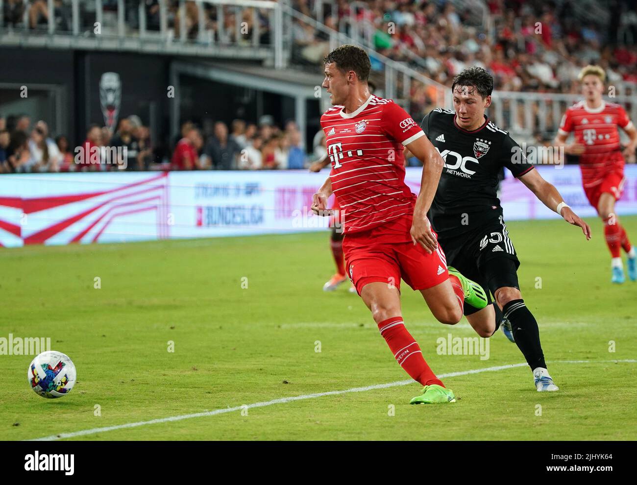 WASHINGTON, DC - JULY 20:  Bayern Munich defender Benjamin Pavard (5) moves the ball away from DC United midfielder Theodore Ku-Dipietro (35) during an international friendly match between D.C United and Bayern Munich, on July 20, 2022, at Audi Field, in Washington, DC. Stock Photo