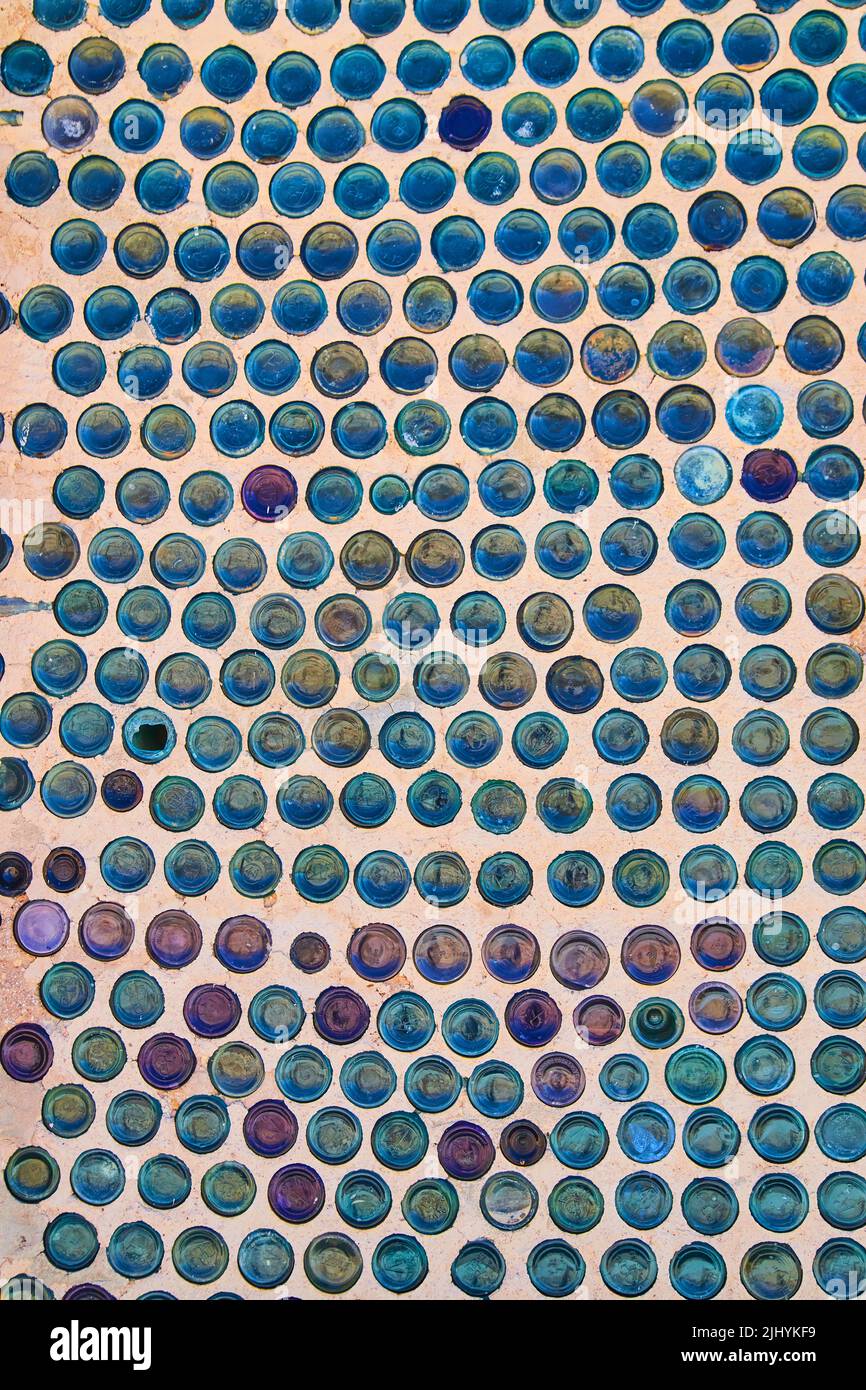 Wall of glass bottles for unique housing material Stock Photo