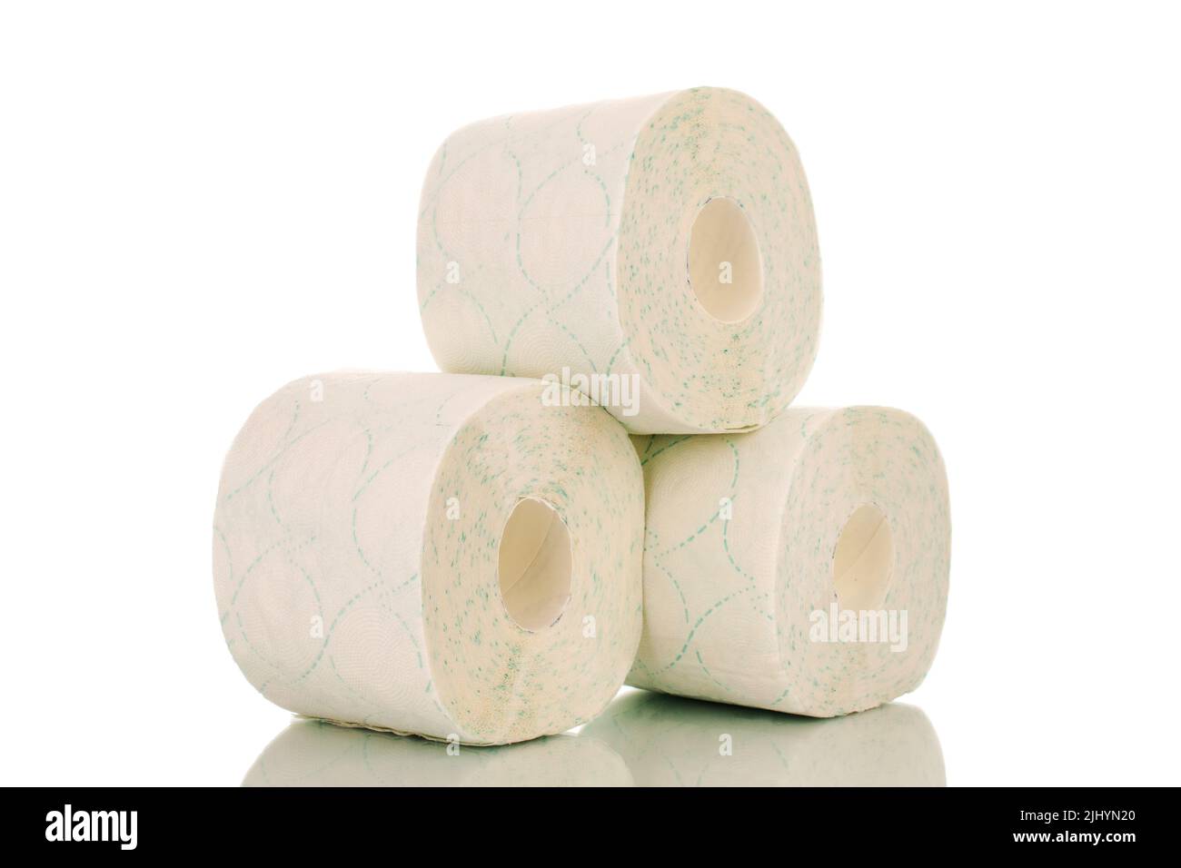 Three rolls of toilet paper, close-up, isolated on a white background Stock Photo
