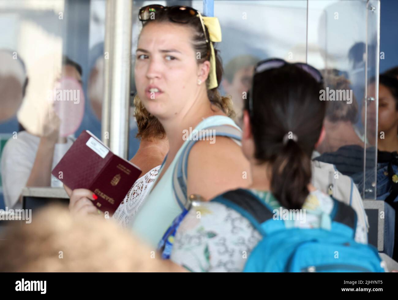 pic shows: Hot weather Stansted 10.7.22  Passengers boiling in Satellite 2 area of the airport. Upstairs floor with no windows or air-conditions as te Stock Photo