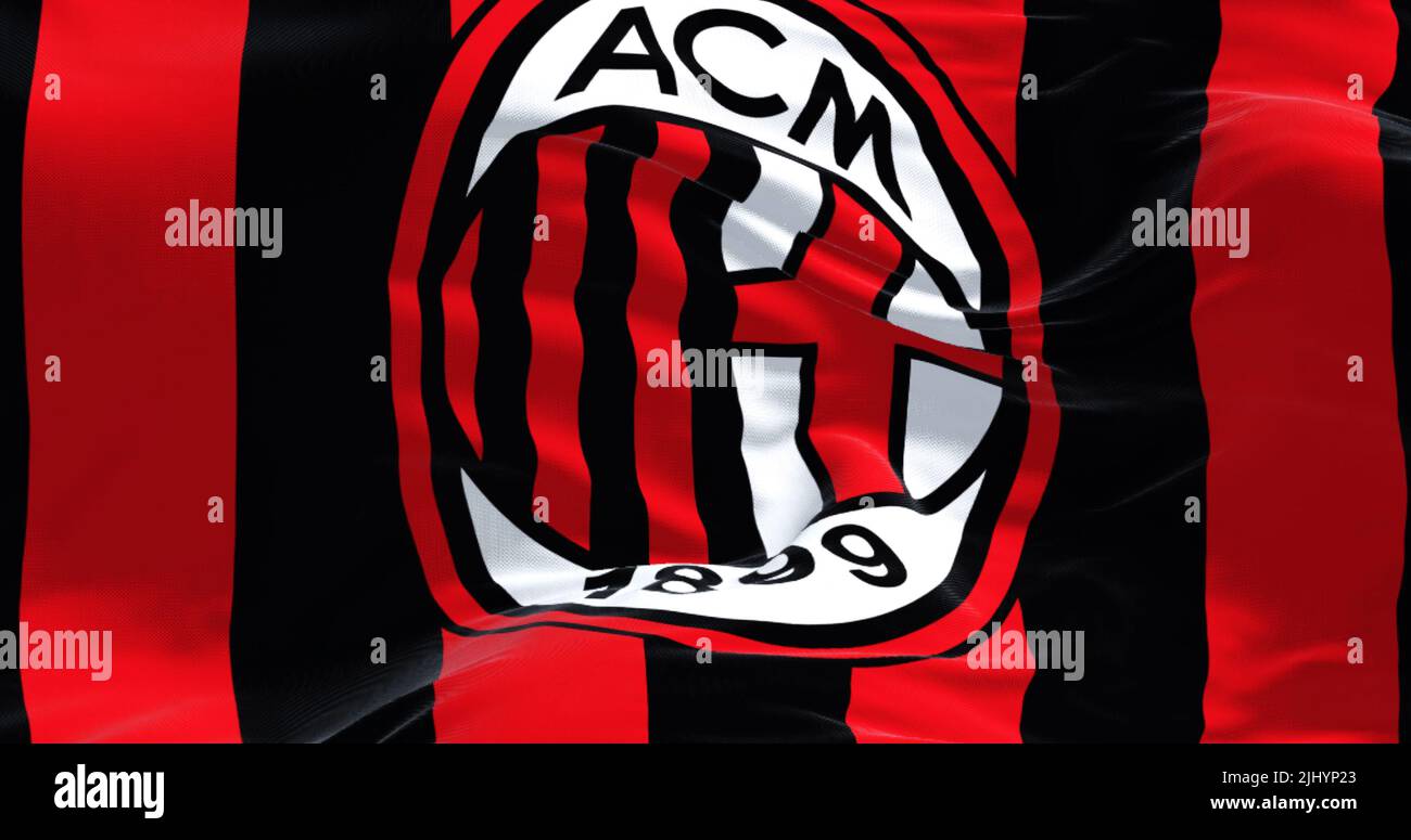 Milan, Italy, July 2022: The flag of A.C. Milan waving in the wind. Milan is a professional football club based in Milan, Italy Stock Photo