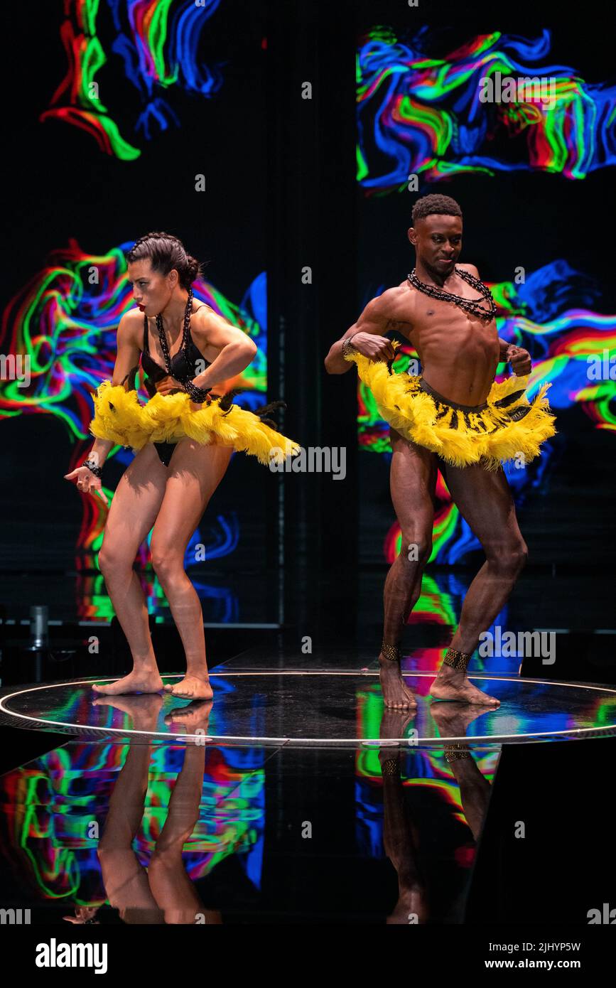Photocall "banana dance" by cast on stage in costume for 'Jean Paul