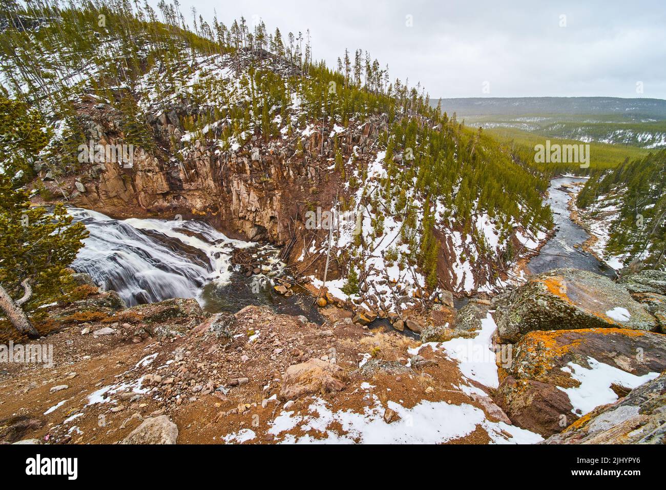 Wide view overlooking Gibbon Falls and river at Yellowstone Stock Photo