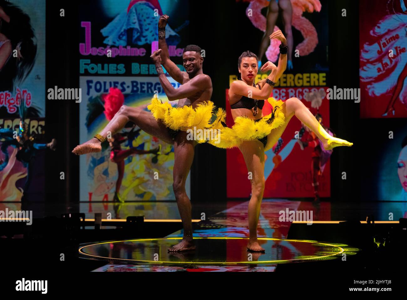 Photocall "banana dance" by cast on stage in costume for 'Jean Paul