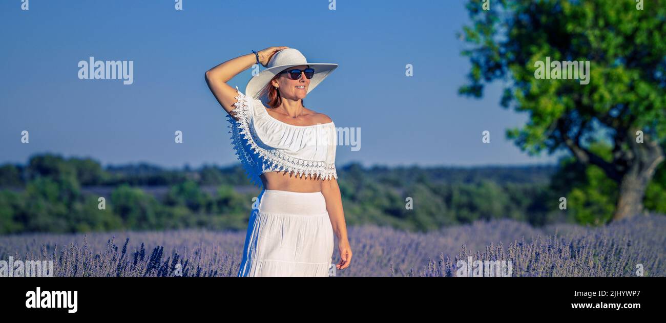 Beautiful woman in lavender field, Valensole, France Stock Photo