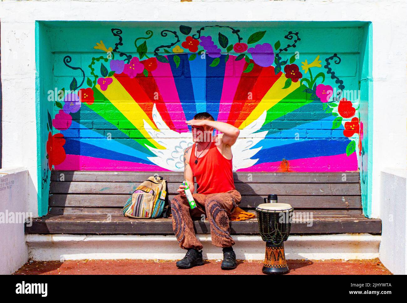 A cool St Leonard's resident plays his bongos on the beach at Goat