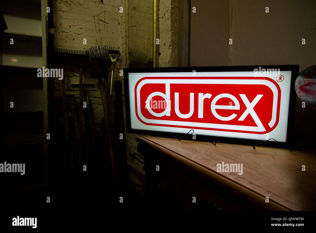 An illuminated Durex advertisment sign Stock Photo