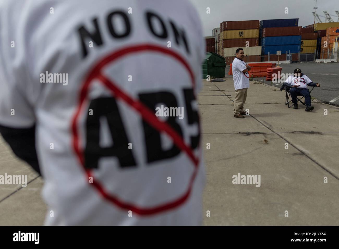 Truck drivers gather to block the entrance of trucks at a container terminal at the Port of Oakland, during a protest against California's law known as AB5, in Oakland, California, July 21, 2022. REUTERS/Carlos Barria Stock Photo