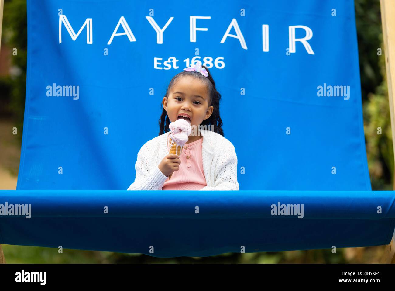 EDITORIAL USE ONLY Atholea Morman aged 4 at the opening of this year's Summer in the Square at Grosvenor Square in Mayfair, London. Picture date: Thursday July 21, 2022. Stock Photo