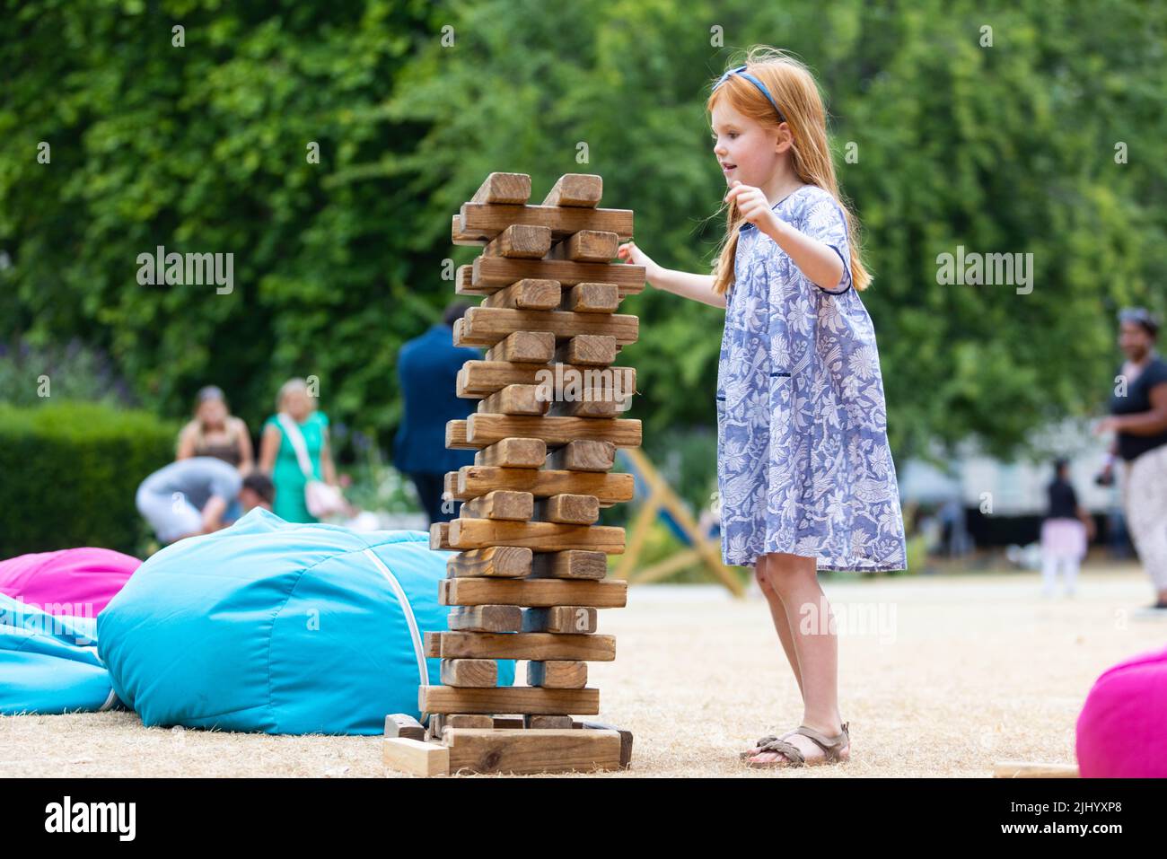 EDITORIAL USE ONLY Charlotte aged 5 at the opening of this year's Summer in the Square at Grosvenor Square in Mayfair, London. Picture date: Thursday July 21, 2022. Stock Photo
