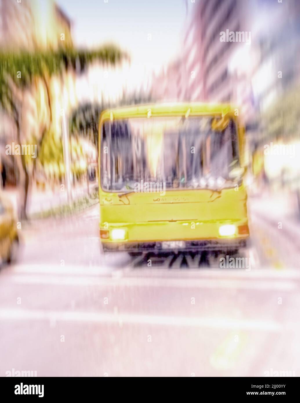 A yellow bus driving and traveling through a bust scene in the city. Commuting through a busy urban town, using public transport to travel the roads Stock Photo