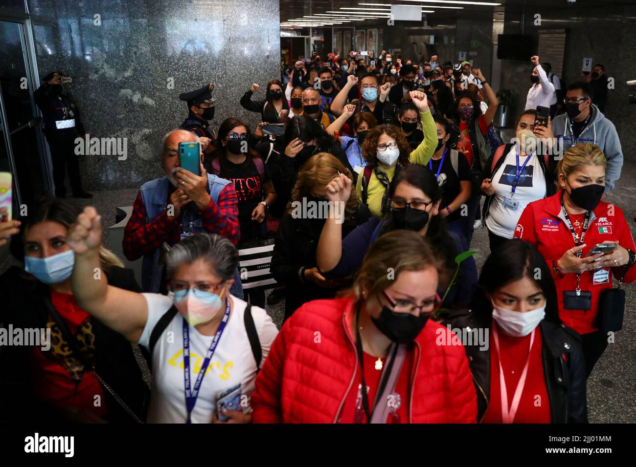 Employees leave the headquarters of Telmex after the company's union went on strike after failing to come to an agreement with the company over a new collective labour agreement, in Mexico City, Mexico, July 21, 2022. REUTERS/Edgard Garrido Stock Photo