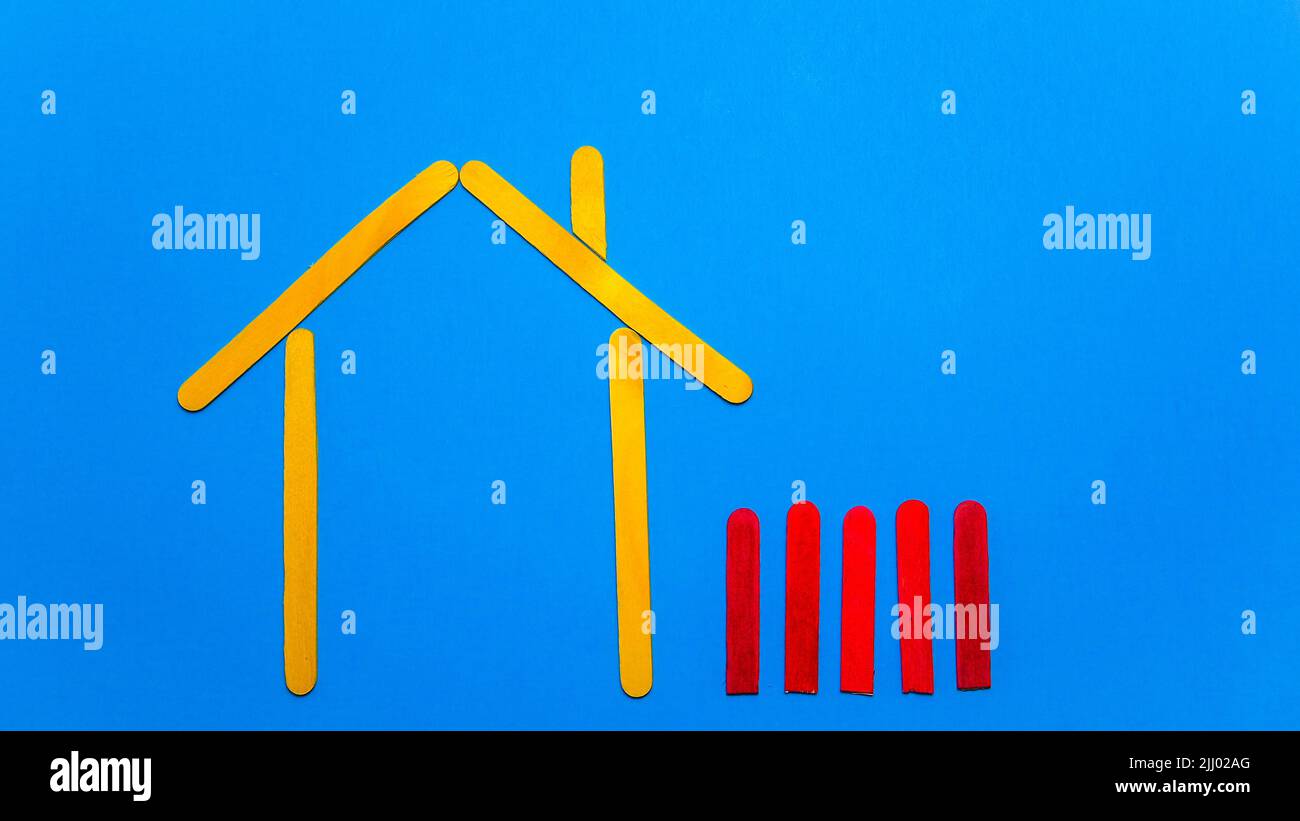 Simple home  on blue background and copy space Stock Photo