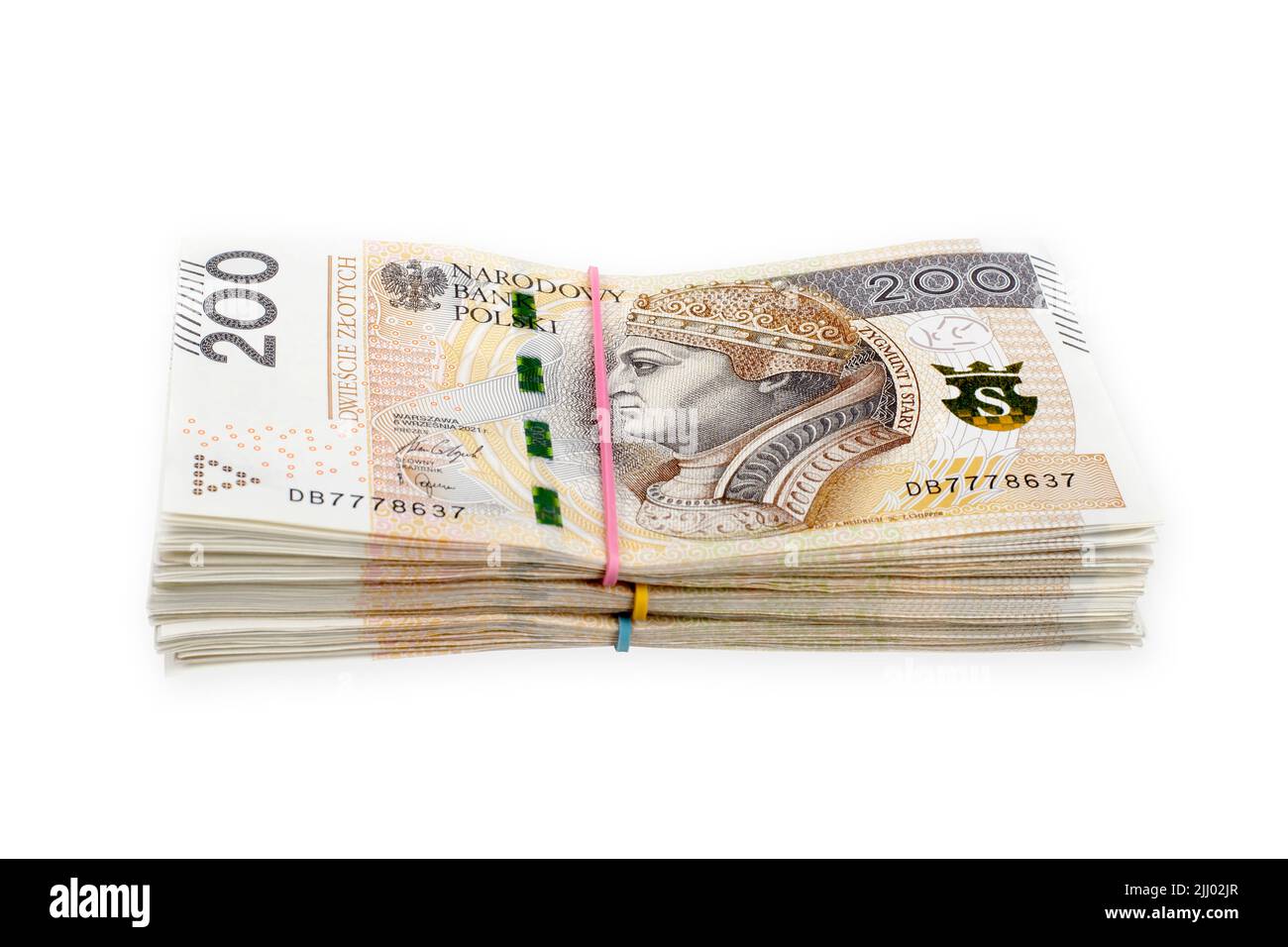 Bundles of polish 200 zloty banknotes. Isolated on white. Clipping path included. Stock Photo