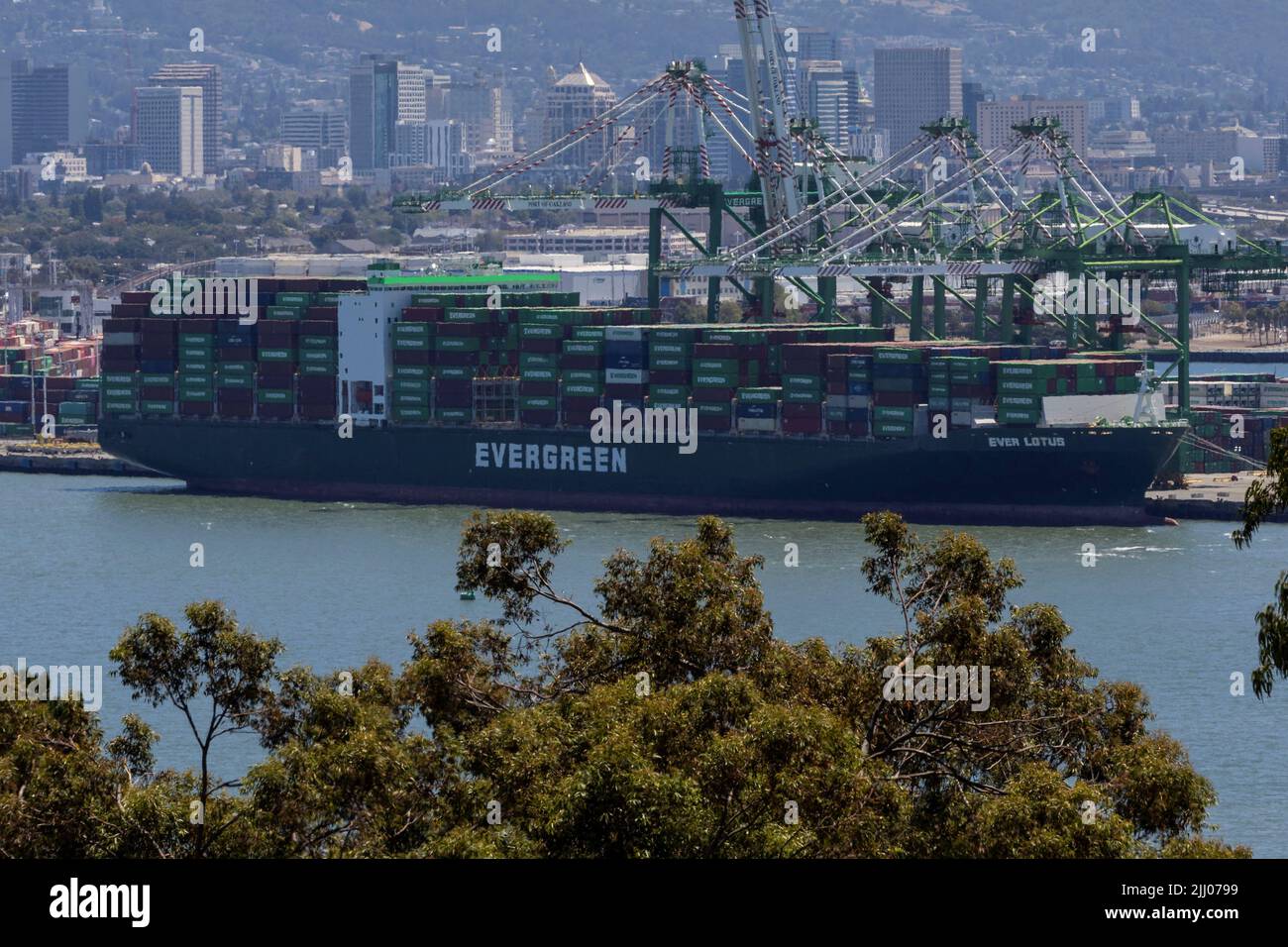 A cargo ship full of shipping containers is seen at the port of Oakland as truck drivers continue protesting against California's new law known as AB5, in Oakland, California, U.S., July 21, 2022. REUTERS/Carlos Barria Stock Photo