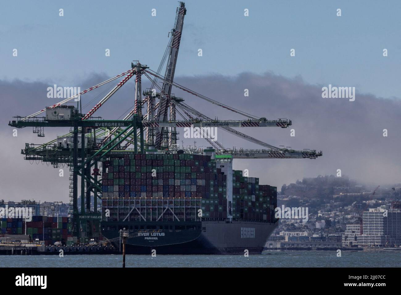 A cargo ship full of shipping containers is seen at the port of Oakland as truck drivers continue protesting against California's new law known as AB5, in Oakland, California, U.S., July 21, 2022. REUTERS/Carlos Barria Stock Photo
